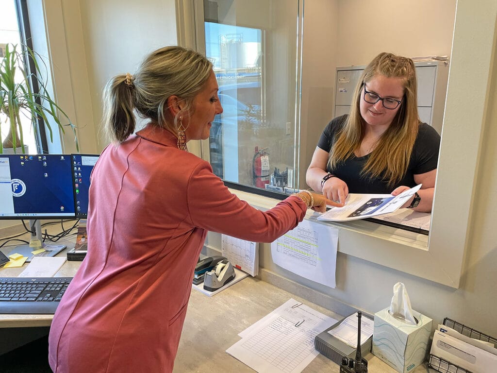 corrigan customer support helping a customer