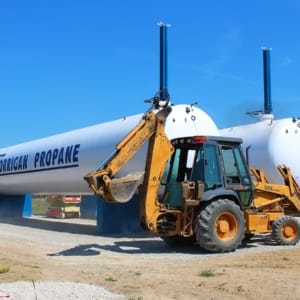 commercial propane tank with a construction truck