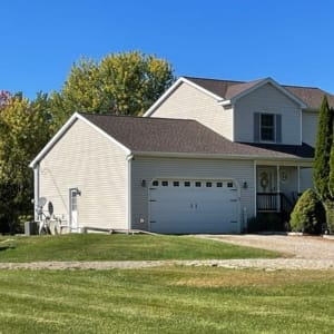 home with a residential propane tank